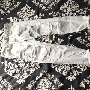 Light denim jeans with holes